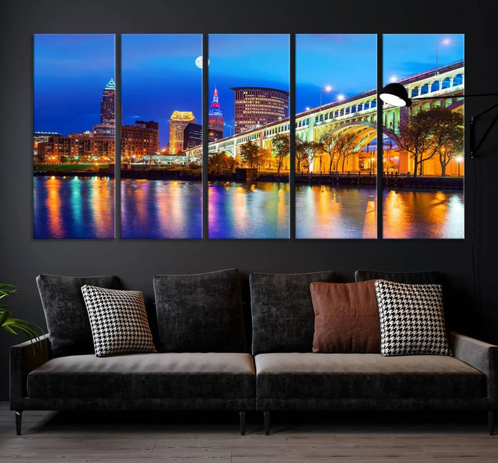 The living room features the "Cleveland Night Skyline Wall Art City Cityscape Canvas Print" prominently displayed, ready to hang.