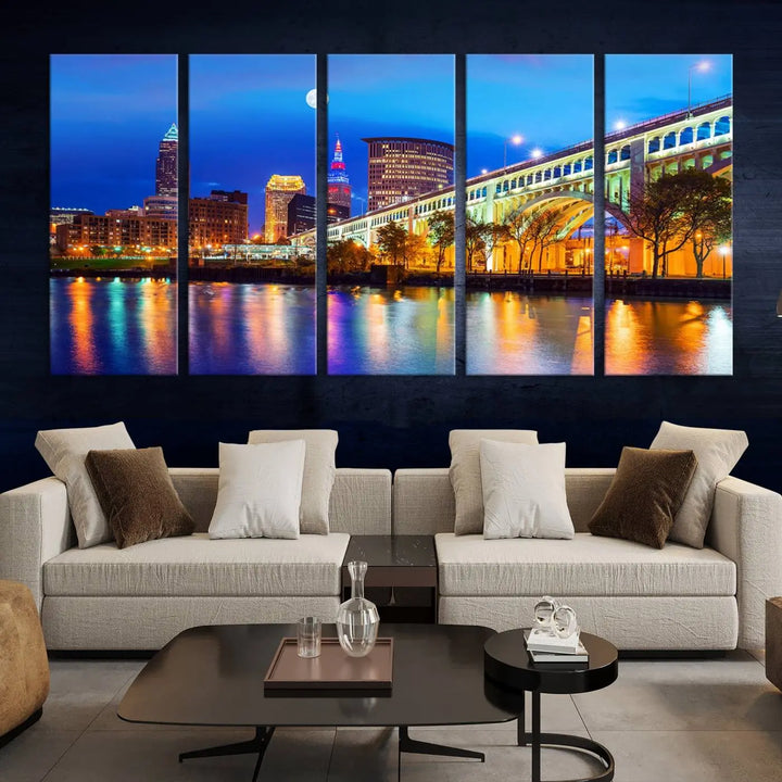 The living room features the "Cleveland Night Skyline Wall Art City Cityscape Canvas Print" prominently displayed, ready to hang.