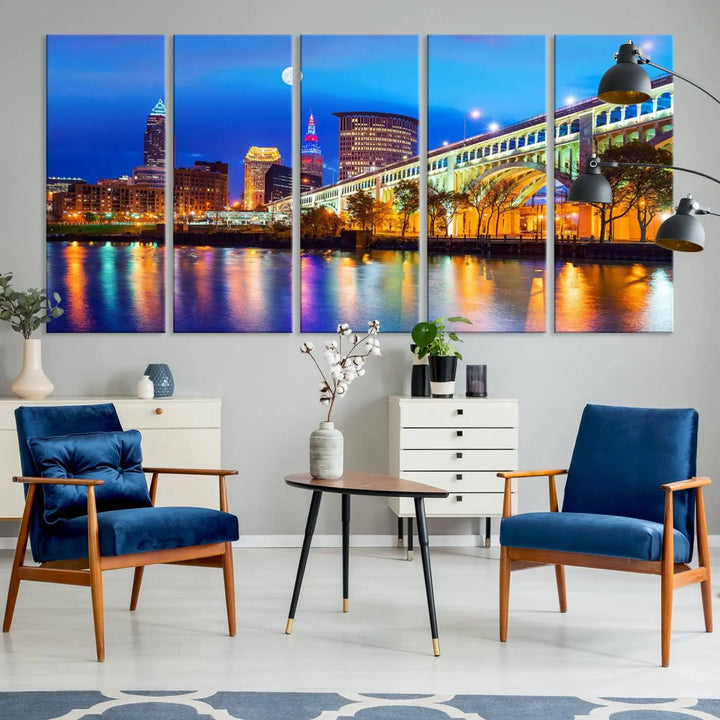 The living room features the "Cleveland Night Skyline Wall Art City Cityscape Canvas Print" prominently displayed, ready to hang.