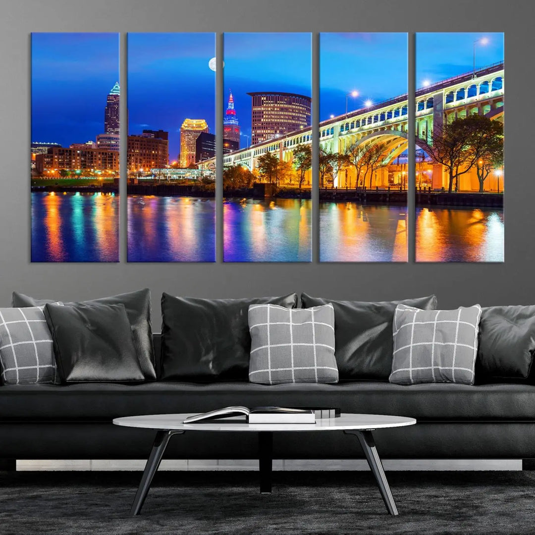 The living room features the "Cleveland Night Skyline Wall Art City Cityscape Canvas Print" prominently displayed, ready to hang.