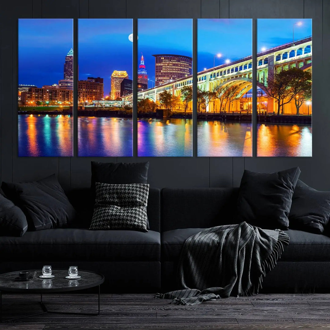 The living room features the "Cleveland Night Skyline Wall Art City Cityscape Canvas Print" prominently displayed, ready to hang.