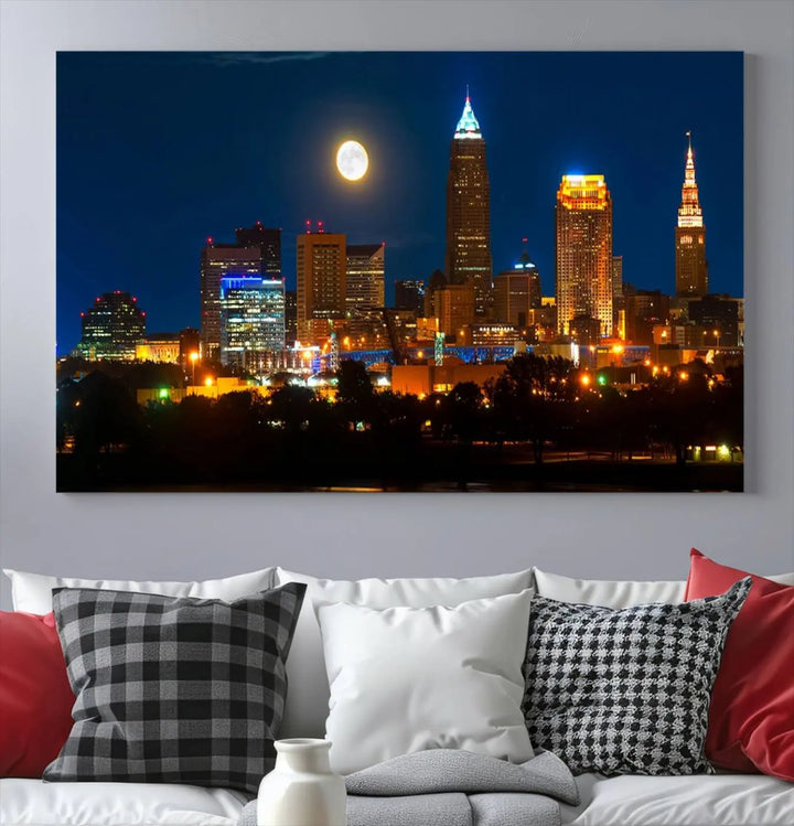 The "Cleveland Night Skyline Wall Art City Cityscape Canvas Print" adds elegance to the room with its depiction of a city skyline and full moon on museum-quality canvas. The artwork is enhanced by a UV-protective coating to ensure lasting brilliance.