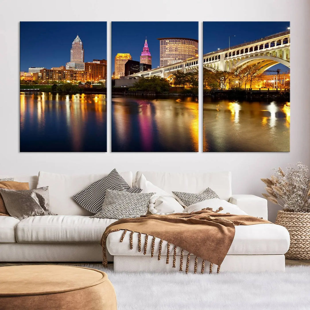 The "Cleveland Night Skyline Wall Art City Cityscape Canvas Print" is a striking feature in the room, showcasing a city skyline with a bridge reflecting in a river. Displayed on museum-quality canvas, it offers enduring beauty.