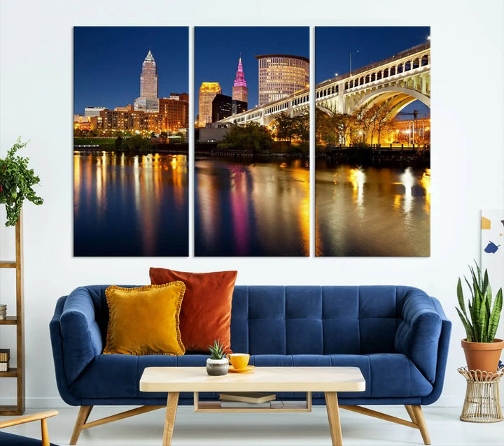 The "Cleveland Night Skyline Wall Art City Cityscape Canvas Print" is a striking feature in the room, showcasing a city skyline with a bridge reflecting in a river. Displayed on museum-quality canvas, it offers enduring beauty.