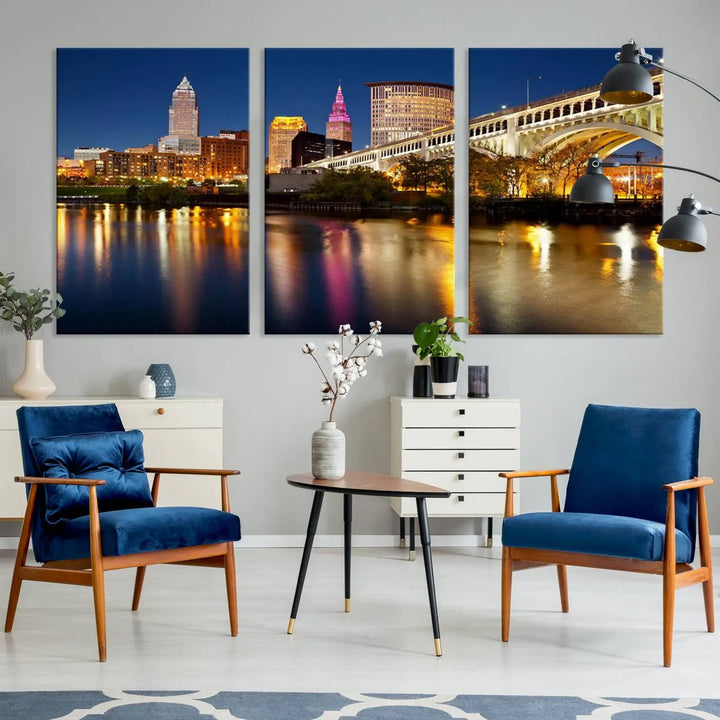 The "Cleveland Night Skyline Wall Art City Cityscape Canvas Print" is a striking feature in the room, showcasing a city skyline with a bridge reflecting in a river. Displayed on museum-quality canvas, it offers enduring beauty.