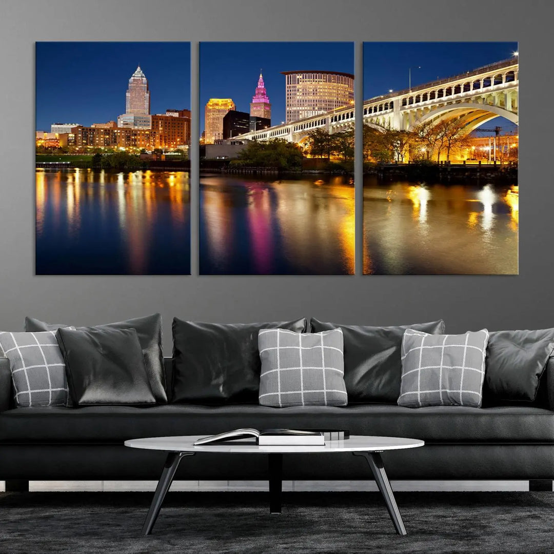 The "Cleveland Night Skyline Wall Art City Cityscape Canvas Print" is a striking feature in the room, showcasing a city skyline with a bridge reflecting in a river. Displayed on museum-quality canvas, it offers enduring beauty.