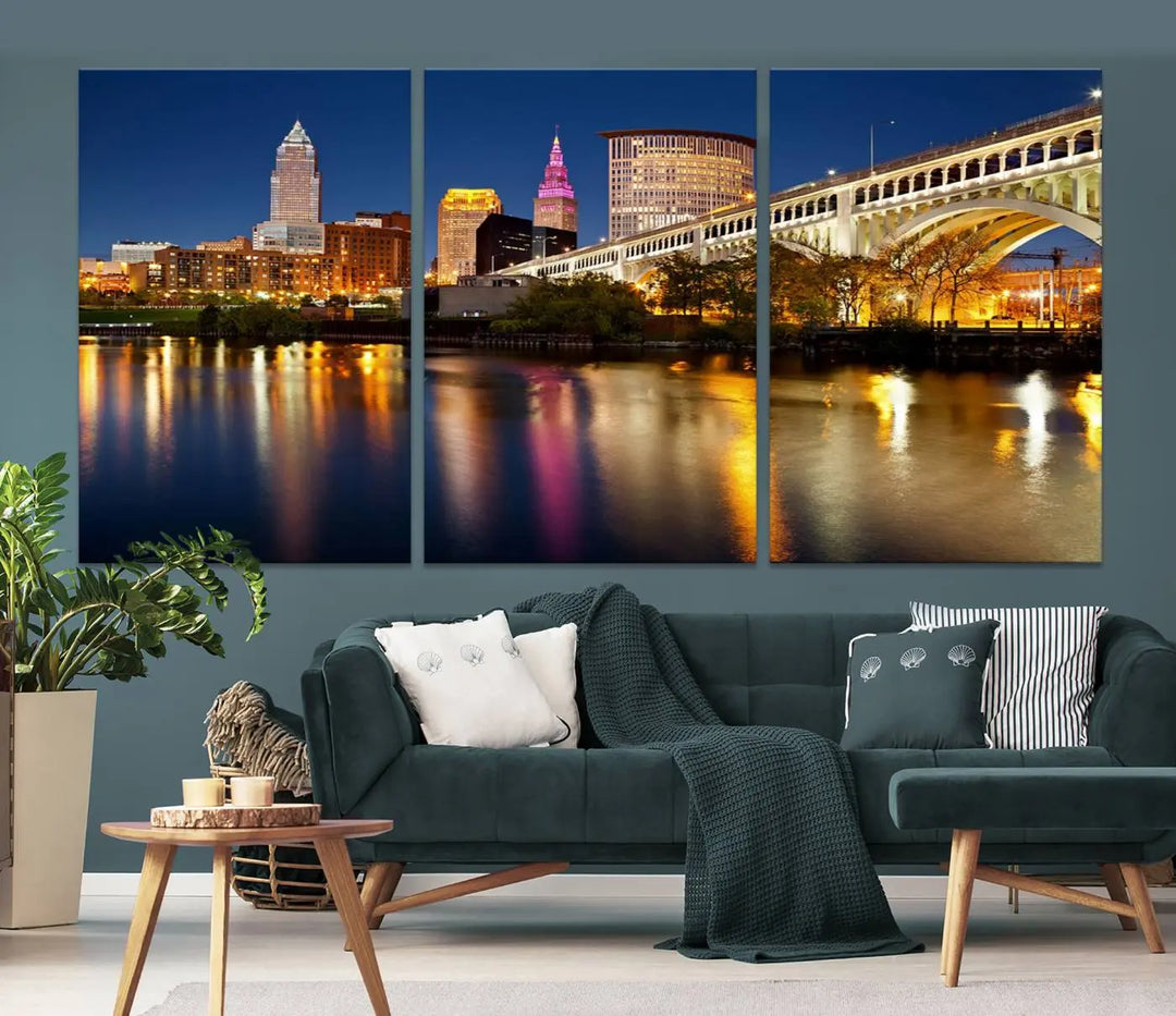 The "Cleveland Night Skyline Wall Art City Cityscape Canvas Print" is a striking feature in the room, showcasing a city skyline with a bridge reflecting in a river. Displayed on museum-quality canvas, it offers enduring beauty.