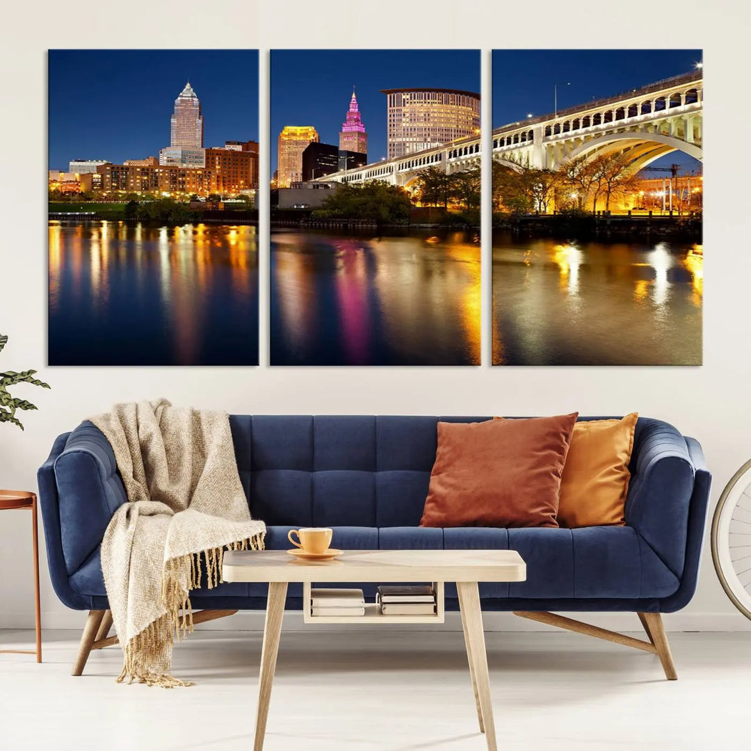 The "Cleveland Night Skyline Wall Art City Cityscape Canvas Print" is a striking feature in the room, showcasing a city skyline with a bridge reflecting in a river. Displayed on museum-quality canvas, it offers enduring beauty.