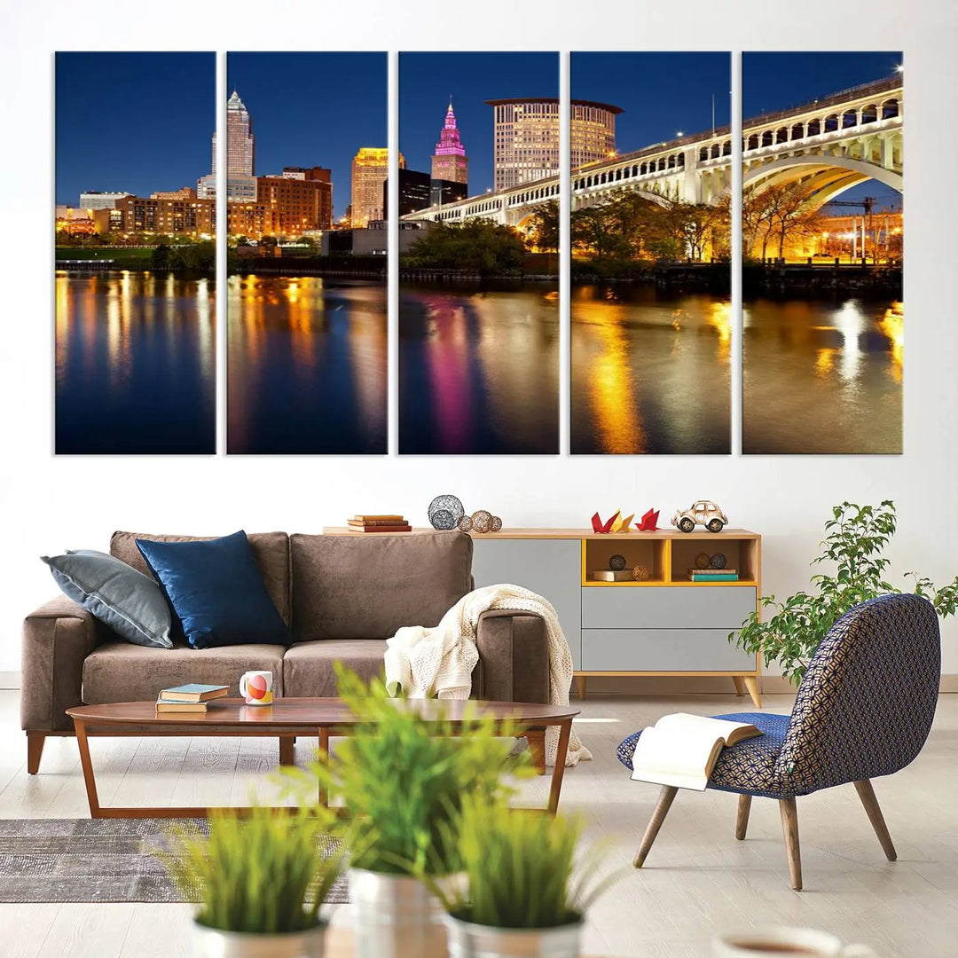 The "Cleveland Night Skyline Wall Art City Cityscape Canvas Print" is a striking feature in the room, showcasing a city skyline with a bridge reflecting in a river. Displayed on museum-quality canvas, it offers enduring beauty.