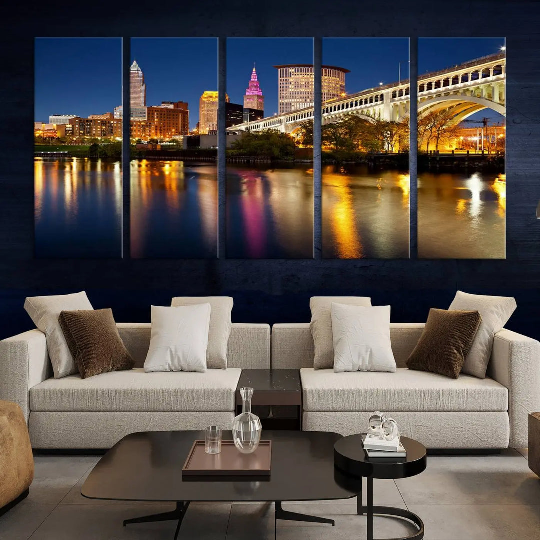 The "Cleveland Night Skyline Wall Art City Cityscape Canvas Print" is a striking feature in the room, showcasing a city skyline with a bridge reflecting in a river. Displayed on museum-quality canvas, it offers enduring beauty.