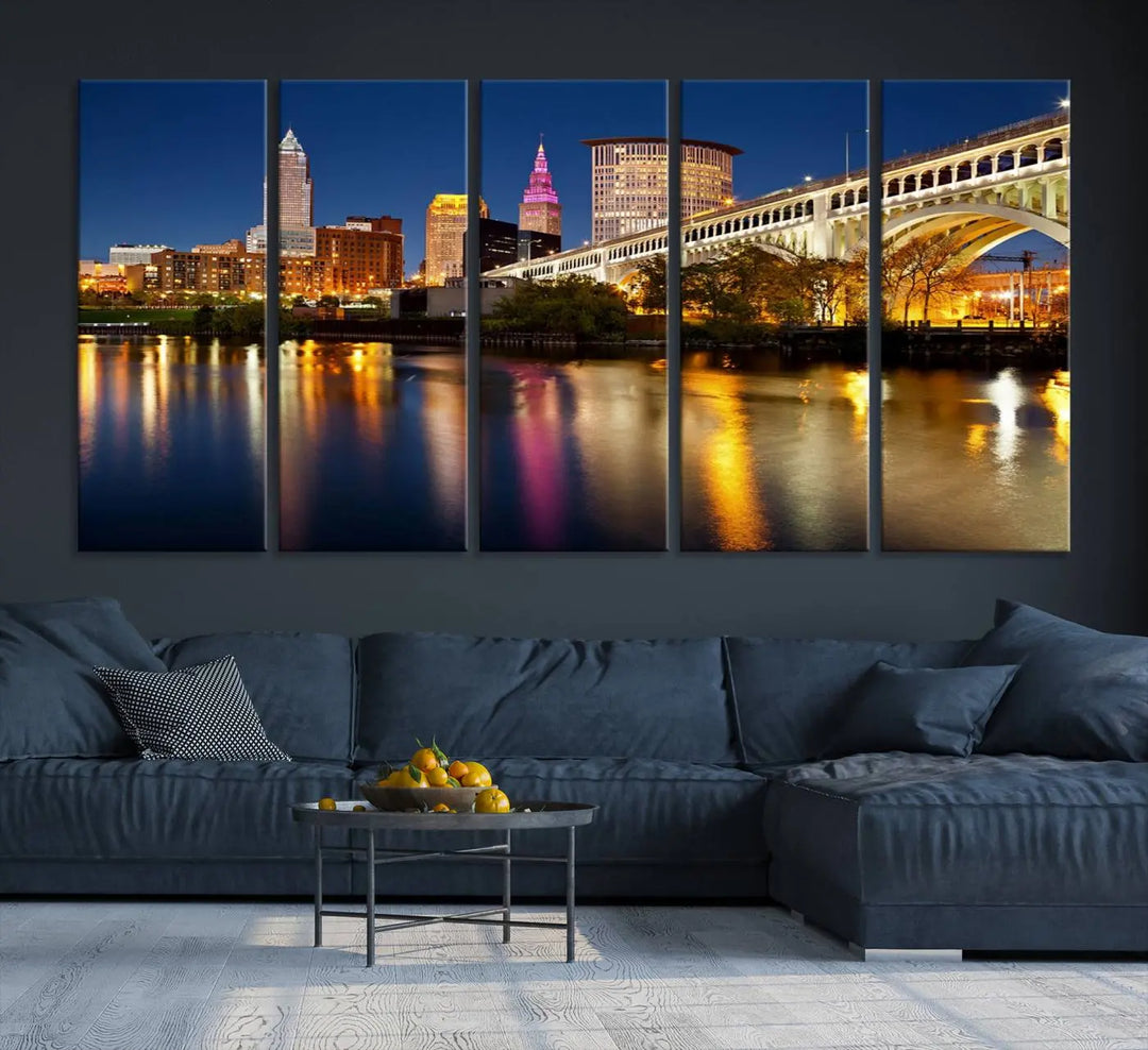 The "Cleveland Night Skyline Wall Art City Cityscape Canvas Print" is a striking feature in the room, showcasing a city skyline with a bridge reflecting in a river. Displayed on museum-quality canvas, it offers enduring beauty.