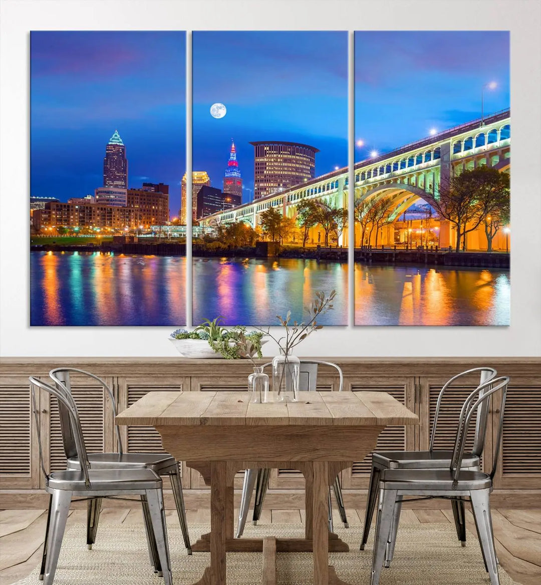 A modern living room features the Cleveland Night Skyline Wall Art City Cityscape Canvas Print, meticulously gallery wrapped on museum-quality canvas.