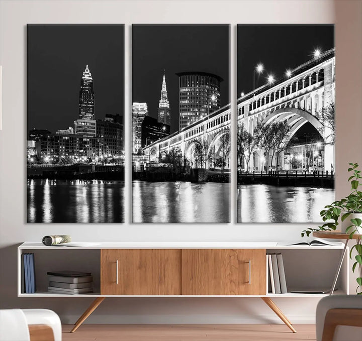 Enhance your space with the Cleveland Night Skyline Wall Art City Cityscape Canvas Print, a museum-quality black and white triptych. This ready-to-hang masterpiece is designed to elevate any room's aesthetic.