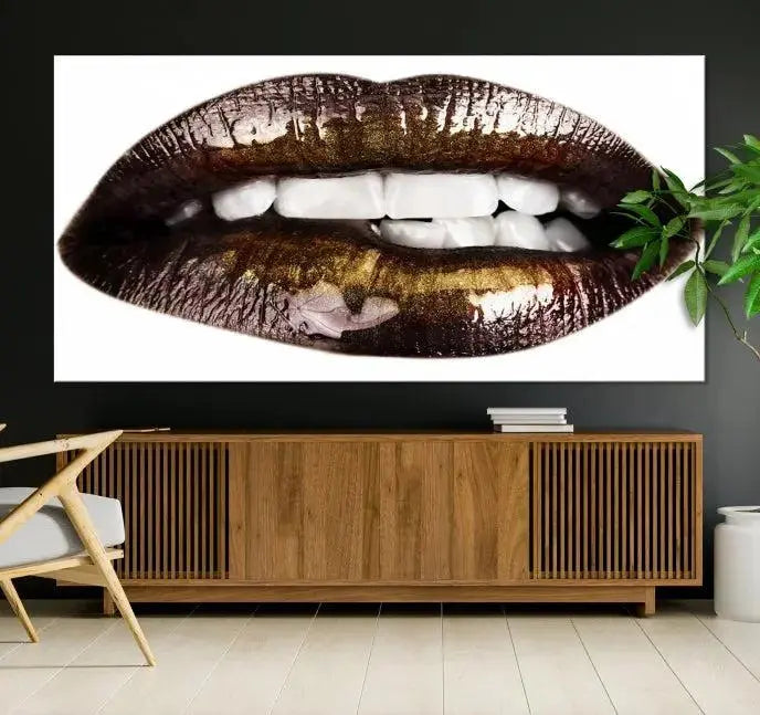 The Close Up Lips Wall Art Canvas Print forms a captivating focal point in this modern living room, showcasing a triptych of glossy, dark lips. Crafted on high-quality polycotton canvas, this piece ensures both durability and vibrant visual appeal.