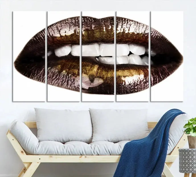 The Close Up Lips Wall Art Canvas Print forms a captivating focal point in this modern living room, showcasing a triptych of glossy, dark lips. Crafted on high-quality polycotton canvas, this piece ensures both durability and vibrant visual appeal.