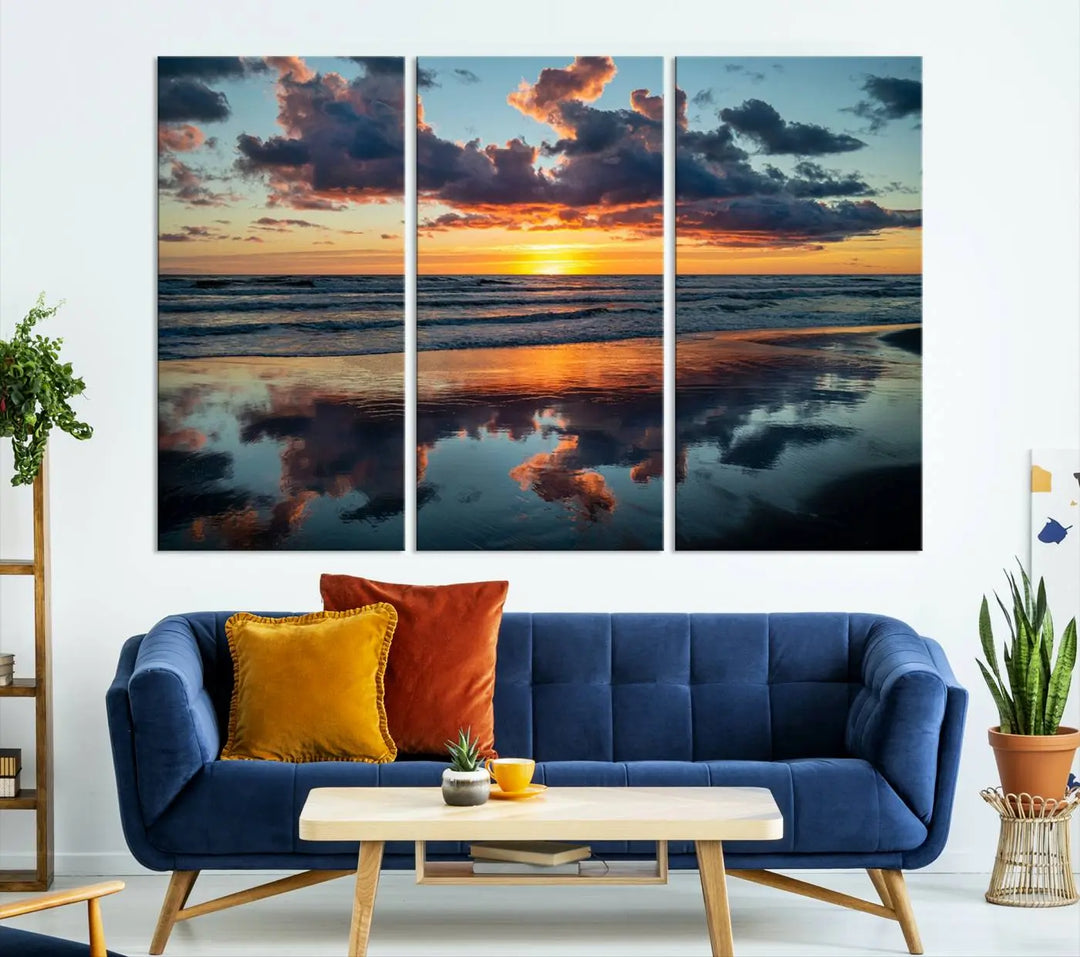 In the living room, the dramatic "Cloudy Weather At The Beach Wall Art Canvas Print" captures an ocean sunset with clouds and reflections on museum-quality canvases crafted in the USA. It features a UV-protective coating to ensure lasting vibrancy.