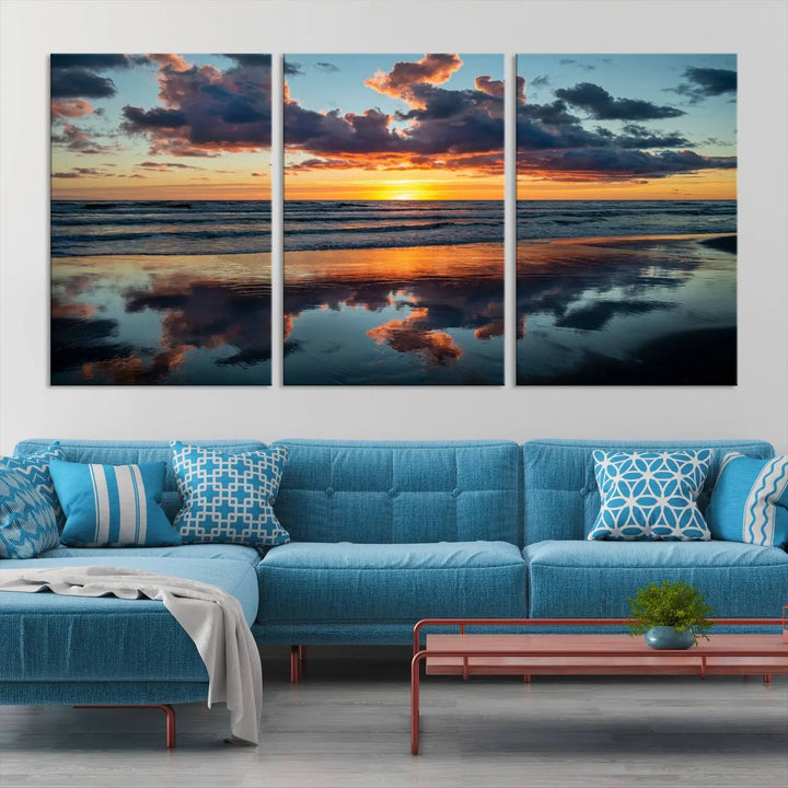 In the living room, the dramatic "Cloudy Weather At The Beach Wall Art Canvas Print" captures an ocean sunset with clouds and reflections on museum-quality canvases crafted in the USA. It features a UV-protective coating to ensure lasting vibrancy.