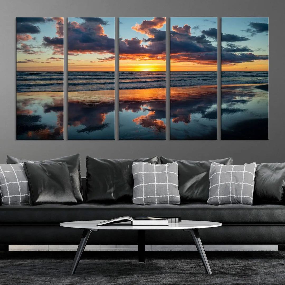 In the living room, the dramatic "Cloudy Weather At The Beach Wall Art Canvas Print" captures an ocean sunset with clouds and reflections on museum-quality canvases crafted in the USA. It features a UV-protective coating to ensure lasting vibrancy.