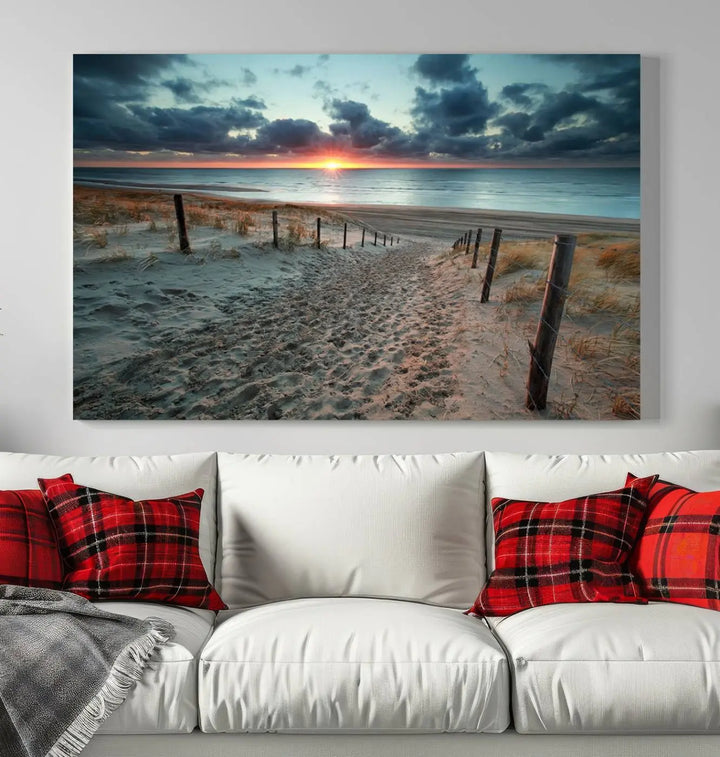 The modern living room features the Cloudy Weather Sunset Beach Wall Art Canvas Print. This museum-quality canvas adds a touch of sophistication with its hand-assembled framed art, ensuring lasting elegance. Enjoy free shipping on this exquisite piece.