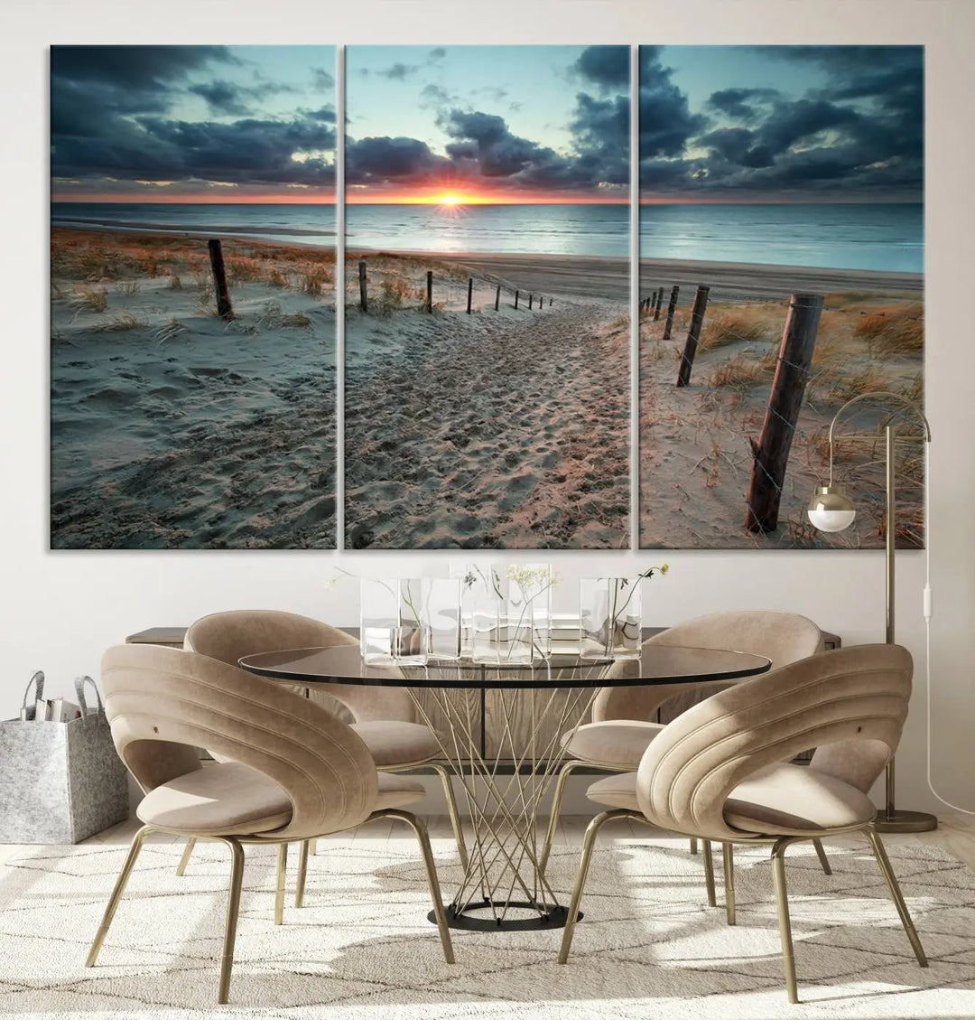 The modern living room features the Cloudy Weather Sunset Beach Wall Art Canvas Print. This museum-quality canvas adds a touch of sophistication with its hand-assembled framed art, ensuring lasting elegance. Enjoy free shipping on this exquisite piece.