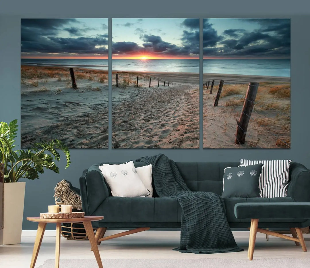 The modern living room features the Cloudy Weather Sunset Beach Wall Art Canvas Print. This museum-quality canvas adds a touch of sophistication with its hand-assembled framed art, ensuring lasting elegance. Enjoy free shipping on this exquisite piece.