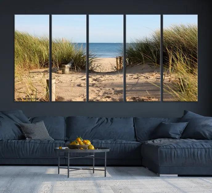 The Coastal Beach Print, showcasing a pathway to beach dunes with grass, is elegantly displayed on a gallery-wrapped museum-quality canvas. This ocean wall art canvas print features a UV-protective coating for enduring beauty.