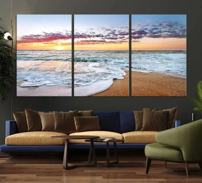 The living room features the Coastal Sunset Art Beach Canvas Wall Art Print, a large 3-panel seascape that beautifully depicts ocean waves during a beach sunset.