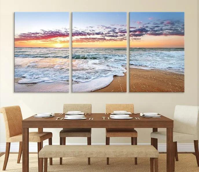 The living room features the Coastal Sunset Art Beach Canvas Wall Art Print, a large 3-panel seascape that beautifully depicts ocean waves during a beach sunset.