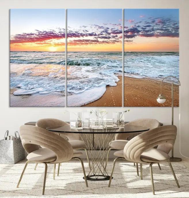 The living room features the Coastal Sunset Art Beach Canvas Wall Art Print, a large 3-panel seascape that beautifully depicts ocean waves during a beach sunset.