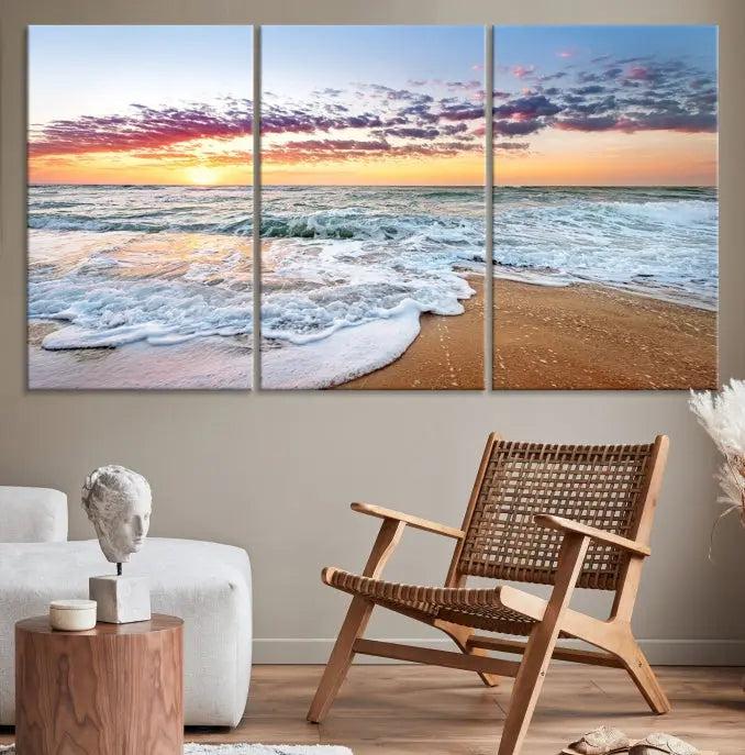 The living room features the Coastal Sunset Art Beach Canvas Wall Art Print, a large 3-panel seascape that beautifully depicts ocean waves during a beach sunset.