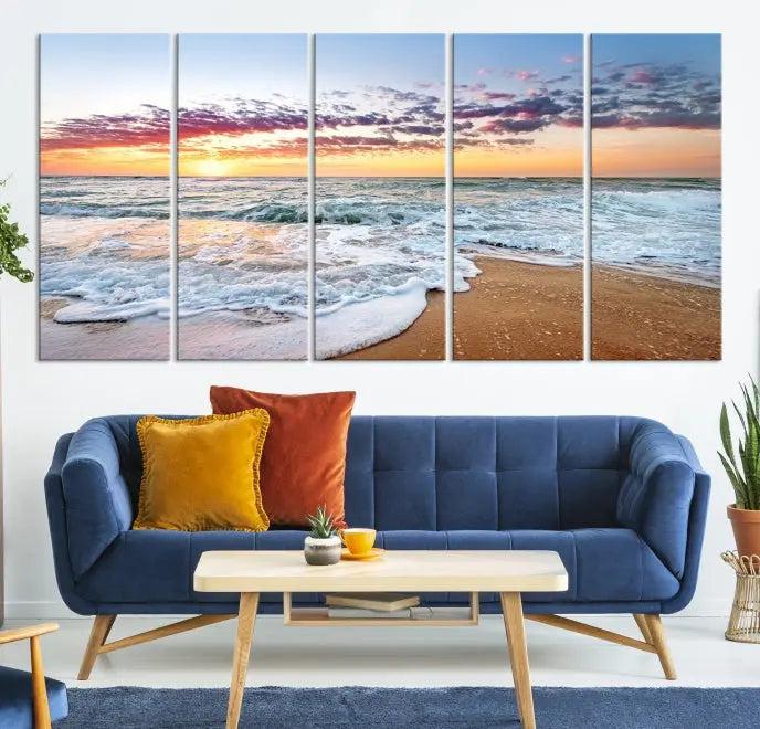 The living room features the Coastal Sunset Art Beach Canvas Wall Art Print, a large 3-panel seascape that beautifully depicts ocean waves during a beach sunset.