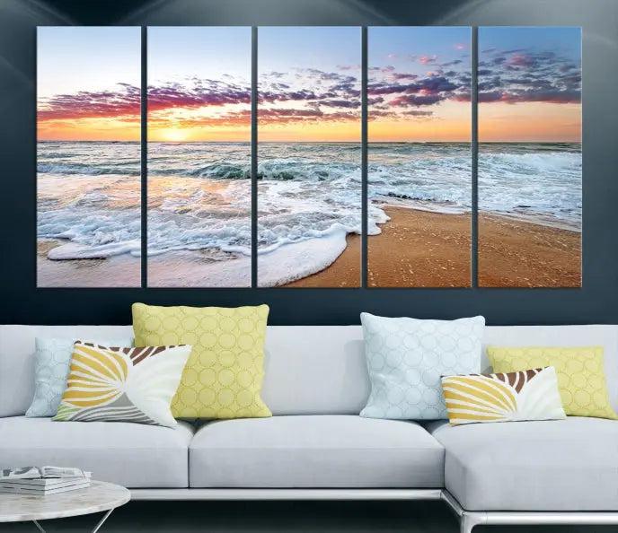 The living room features the Coastal Sunset Art Beach Canvas Wall Art Print, a large 3-panel seascape that beautifully depicts ocean waves during a beach sunset.