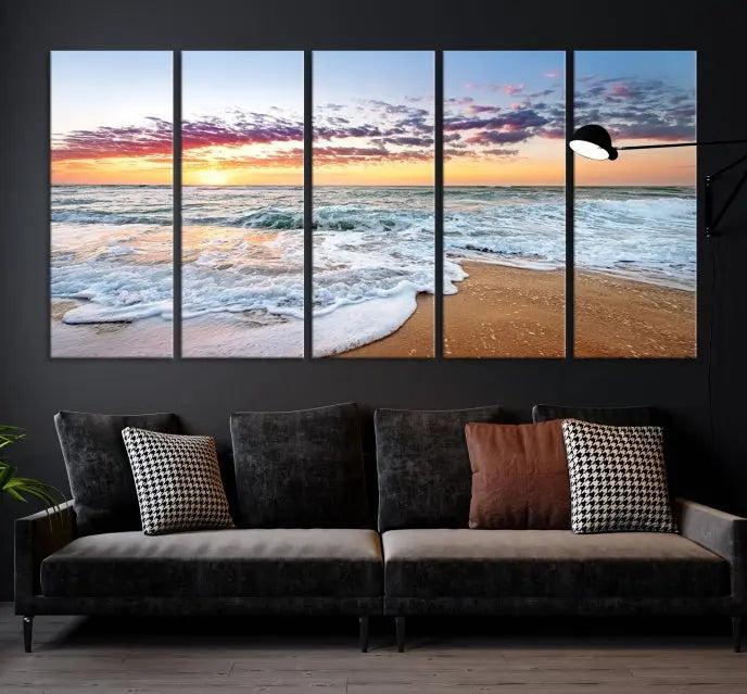 The living room features the Coastal Sunset Art Beach Canvas Wall Art Print, a large 3-panel seascape that beautifully depicts ocean waves during a beach sunset.