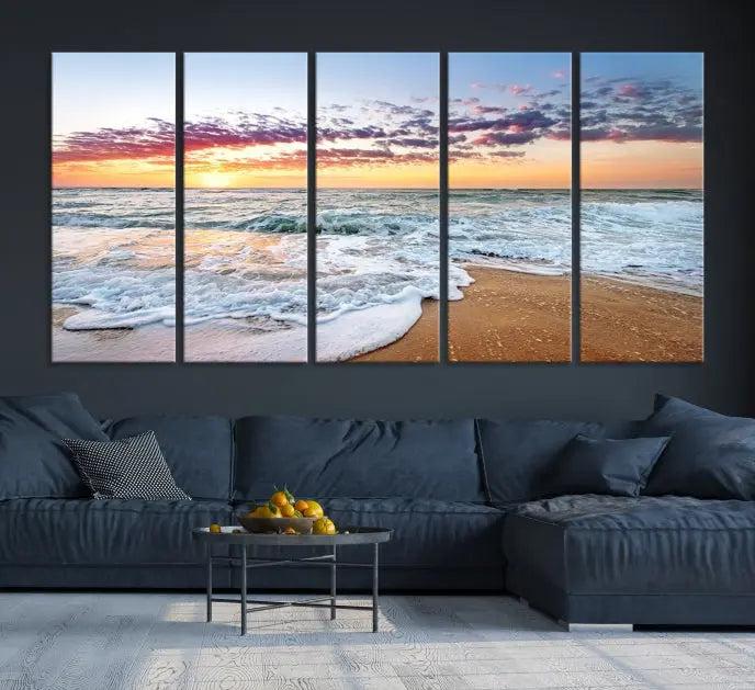 The living room features the Coastal Sunset Art Beach Canvas Wall Art Print, a large 3-panel seascape that beautifully depicts ocean waves during a beach sunset.