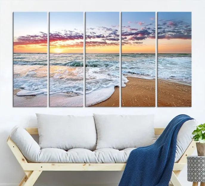 The living room features the Coastal Sunset Art Beach Canvas Wall Art Print, a large 3-panel seascape that beautifully depicts ocean waves during a beach sunset.