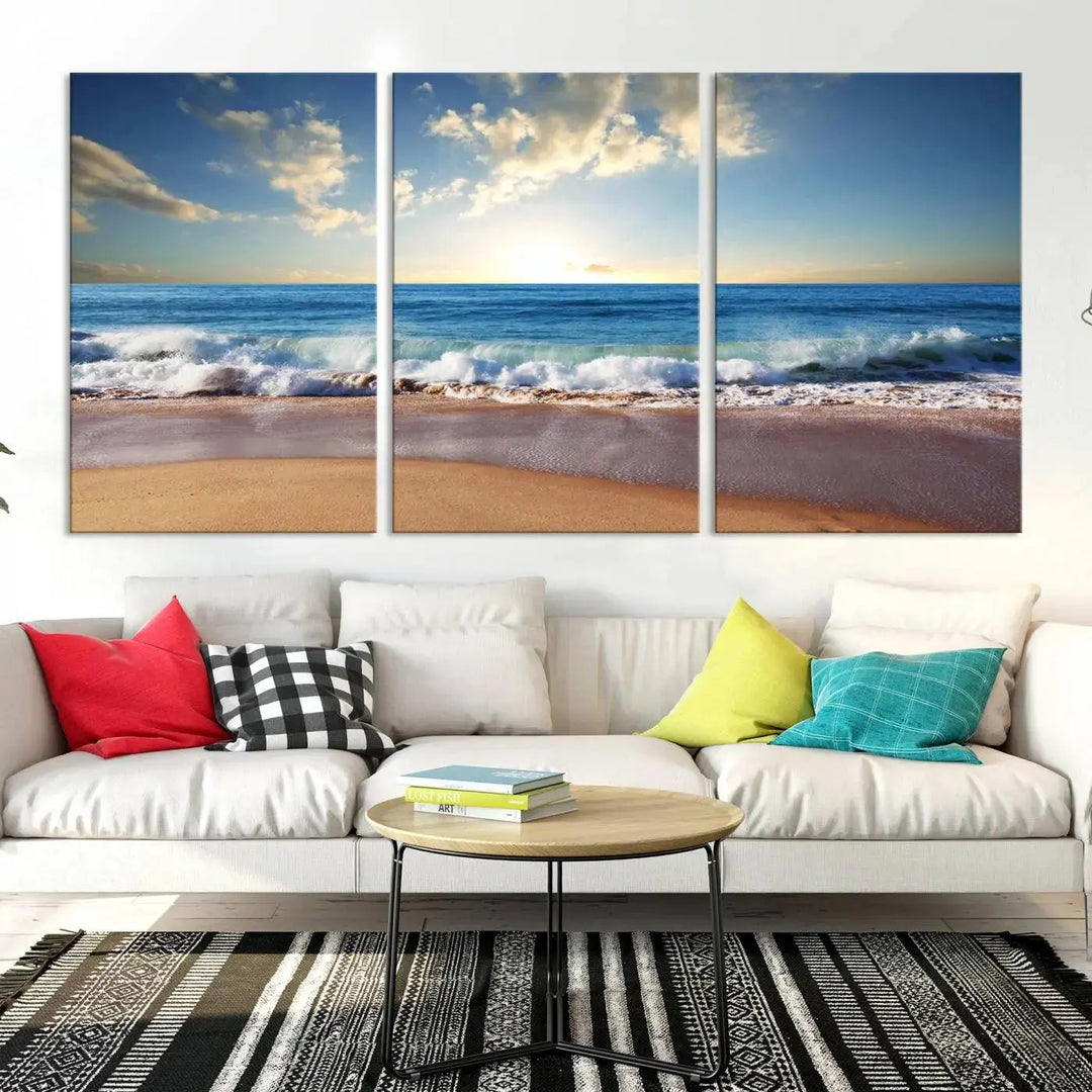 A triptych of the "Coastal Tropical Beach Sunset Canvas Wall Art Print" adorns the dark wall. Featuring a serene beach scene, its gallery-wrapped edges offer a polished look, while a UV-protective coating ensures lasting vibrancy.