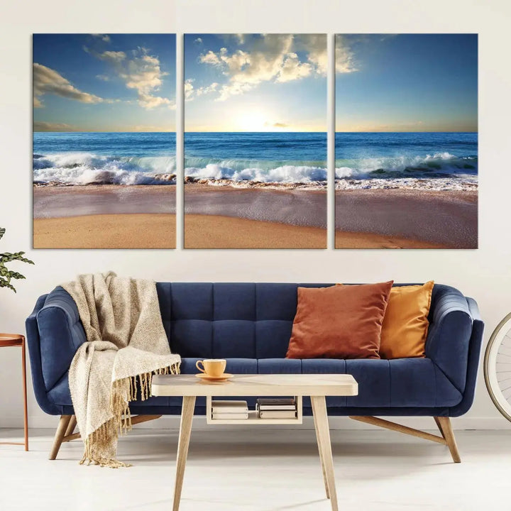 A triptych of the "Coastal Tropical Beach Sunset Canvas Wall Art Print" adorns the dark wall. Featuring a serene beach scene, its gallery-wrapped edges offer a polished look, while a UV-protective coating ensures lasting vibrancy.