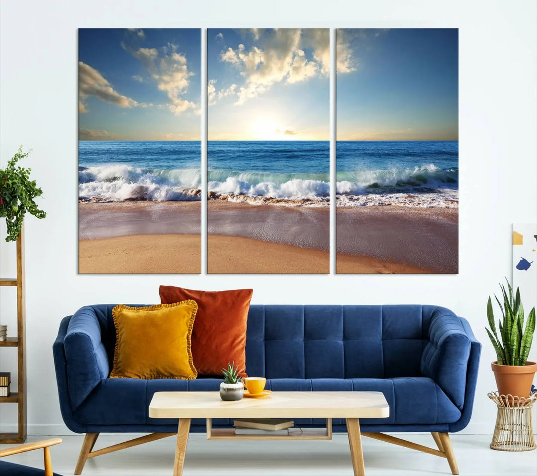 A triptych of the "Coastal Tropical Beach Sunset Canvas Wall Art Print" adorns the dark wall. Featuring a serene beach scene, its gallery-wrapped edges offer a polished look, while a UV-protective coating ensures lasting vibrancy.