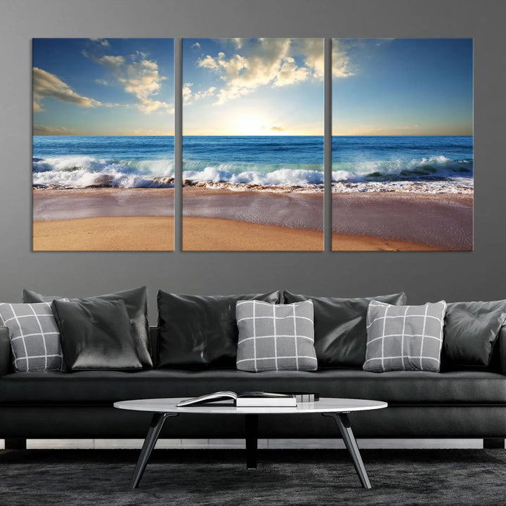 A triptych of the "Coastal Tropical Beach Sunset Canvas Wall Art Print" adorns the dark wall. Featuring a serene beach scene, its gallery-wrapped edges offer a polished look, while a UV-protective coating ensures lasting vibrancy.