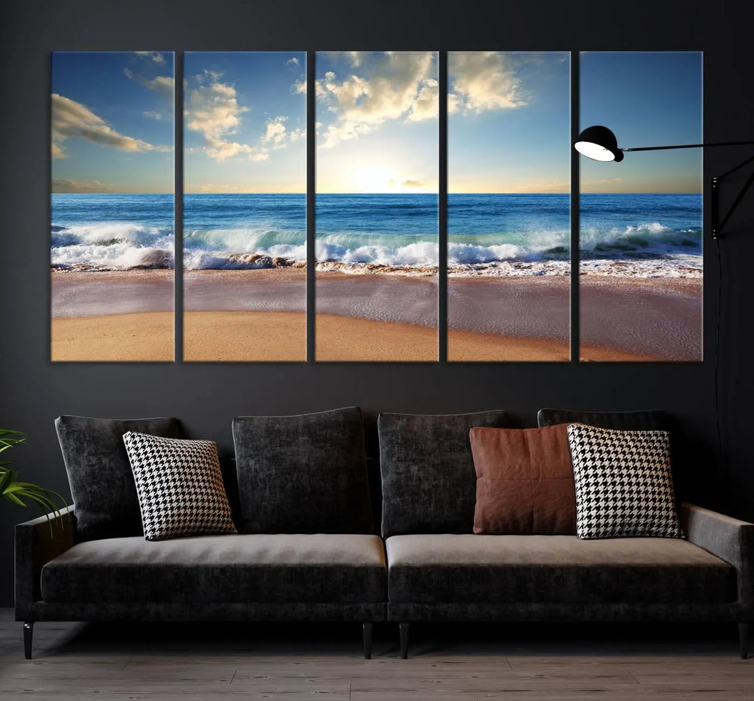 A triptych of the "Coastal Tropical Beach Sunset Canvas Wall Art Print" adorns the dark wall. Featuring a serene beach scene, its gallery-wrapped edges offer a polished look, while a UV-protective coating ensures lasting vibrancy.