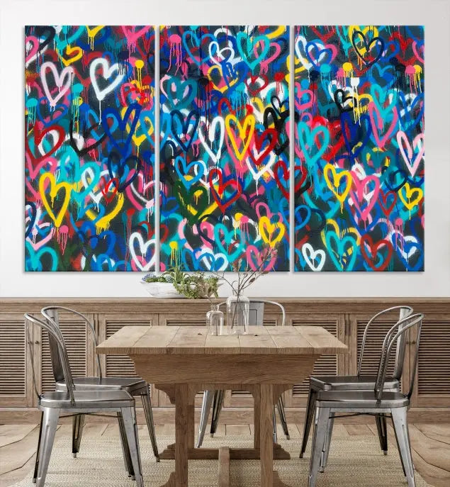 The Color Hands Wall Art Canvas Print features vibrant heart graffiti artwork on three museum-quality canvases, each expertly gallery wrapped and coated for UV protection to ensure durability.