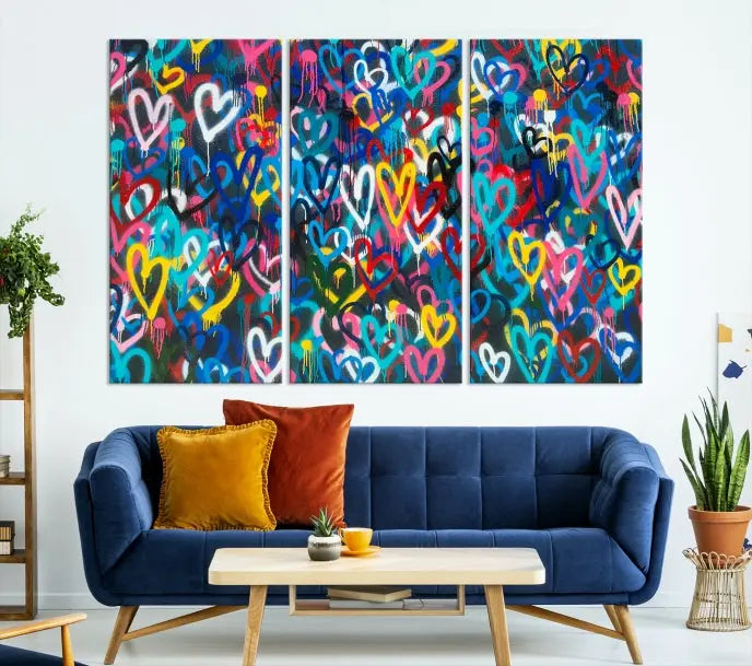 The Color Hands Wall Art Canvas Print features vibrant heart graffiti artwork on three museum-quality canvases, each expertly gallery wrapped and coated for UV protection to ensure durability.