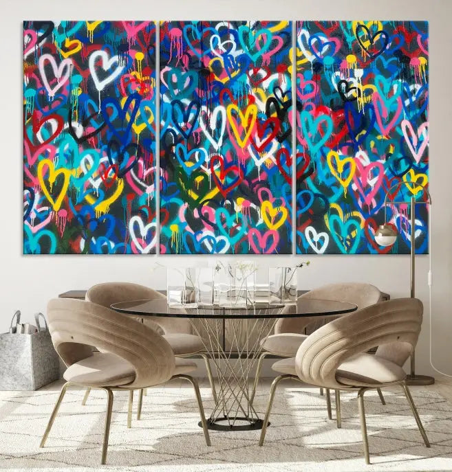 The Color Hands Wall Art Canvas Print features vibrant heart graffiti artwork on three museum-quality canvases, each expertly gallery wrapped and coated for UV protection to ensure durability.