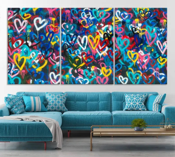 The Color Hands Wall Art Canvas Print features vibrant heart graffiti artwork on three museum-quality canvases, each expertly gallery wrapped and coated for UV protection to ensure durability.