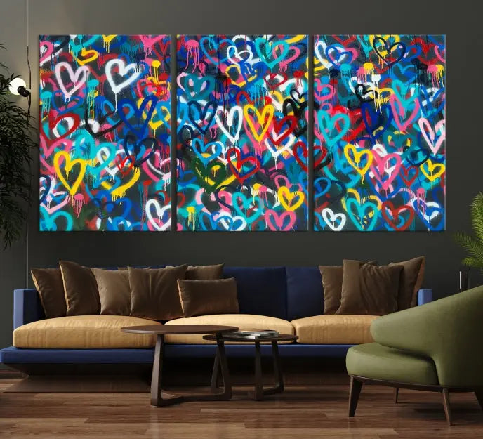 The Color Hands Wall Art Canvas Print features vibrant heart graffiti artwork on three museum-quality canvases, each expertly gallery wrapped and coated for UV protection to ensure durability.