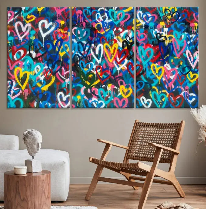 The Color Hands Wall Art Canvas Print features vibrant heart graffiti artwork on three museum-quality canvases, each expertly gallery wrapped and coated for UV protection to ensure durability.