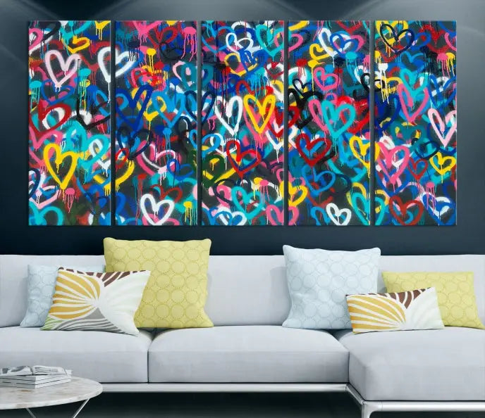 The Color Hands Wall Art Canvas Print features vibrant heart graffiti artwork on three museum-quality canvases, each expertly gallery wrapped and coated for UV protection to ensure durability.