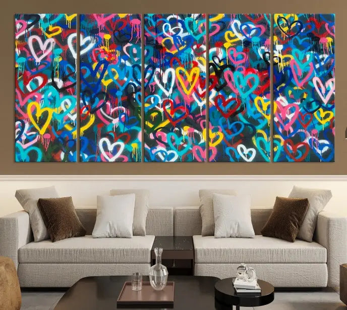 The Color Hands Wall Art Canvas Print features vibrant heart graffiti artwork on three museum-quality canvases, each expertly gallery wrapped and coated for UV protection to ensure durability.