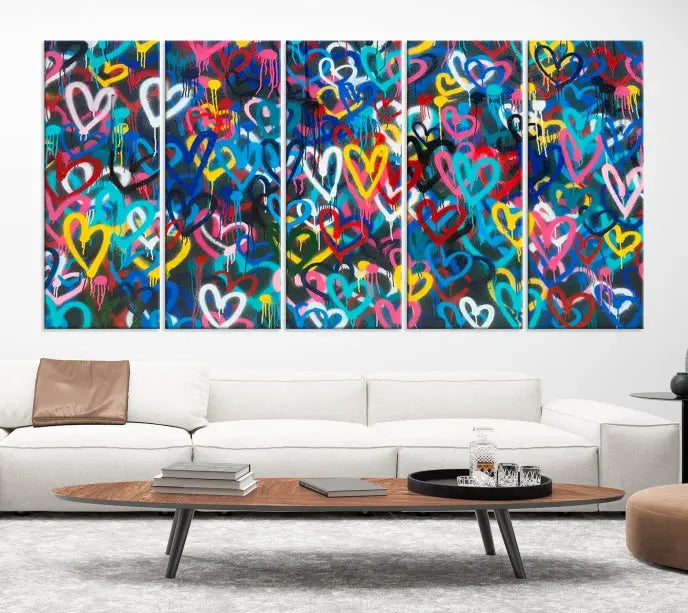 The Color Hands Wall Art Canvas Print features vibrant heart graffiti artwork on three museum-quality canvases, each expertly gallery wrapped and coated for UV protection to ensure durability.