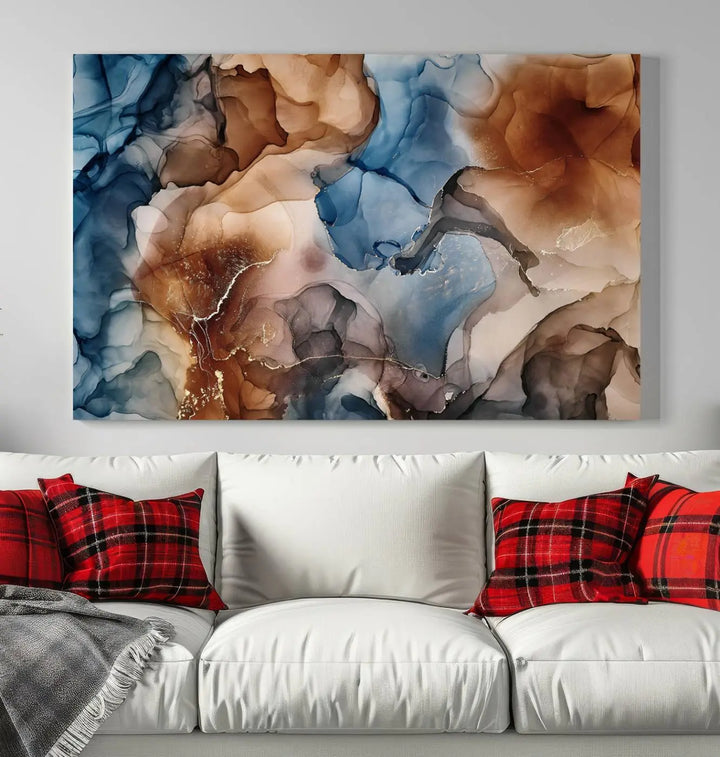 The "Colorful Abstract Clouds Canvas Wall Art Print," featuring an earthy and blue-toned color palette, hangs against a dark wall.